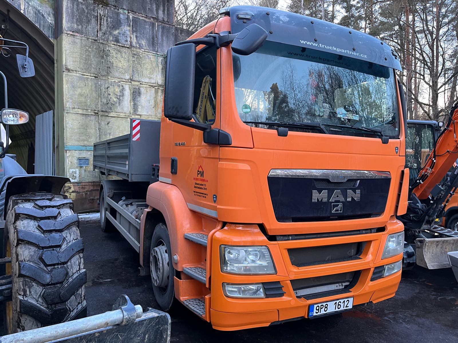 MAN TGS 18.400 v barvě firmy